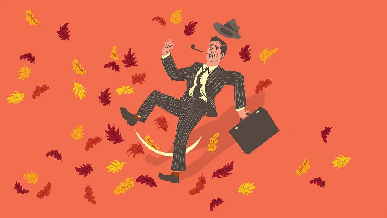 Cartoon of suited office worker slipping backward amid falling leaves, briefcase in hand and hat tossed in air