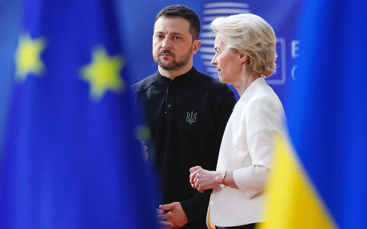 European Commission President Ursula von der Leyen speaks with Ukrainian President Volodymyr Zelensky at the European Council building in Brussels, Belgium