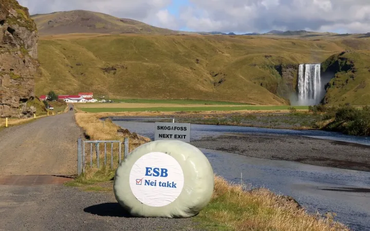 Hay bales near Skogafoss carrying anti-EU slogan in Skogar, Iceland
