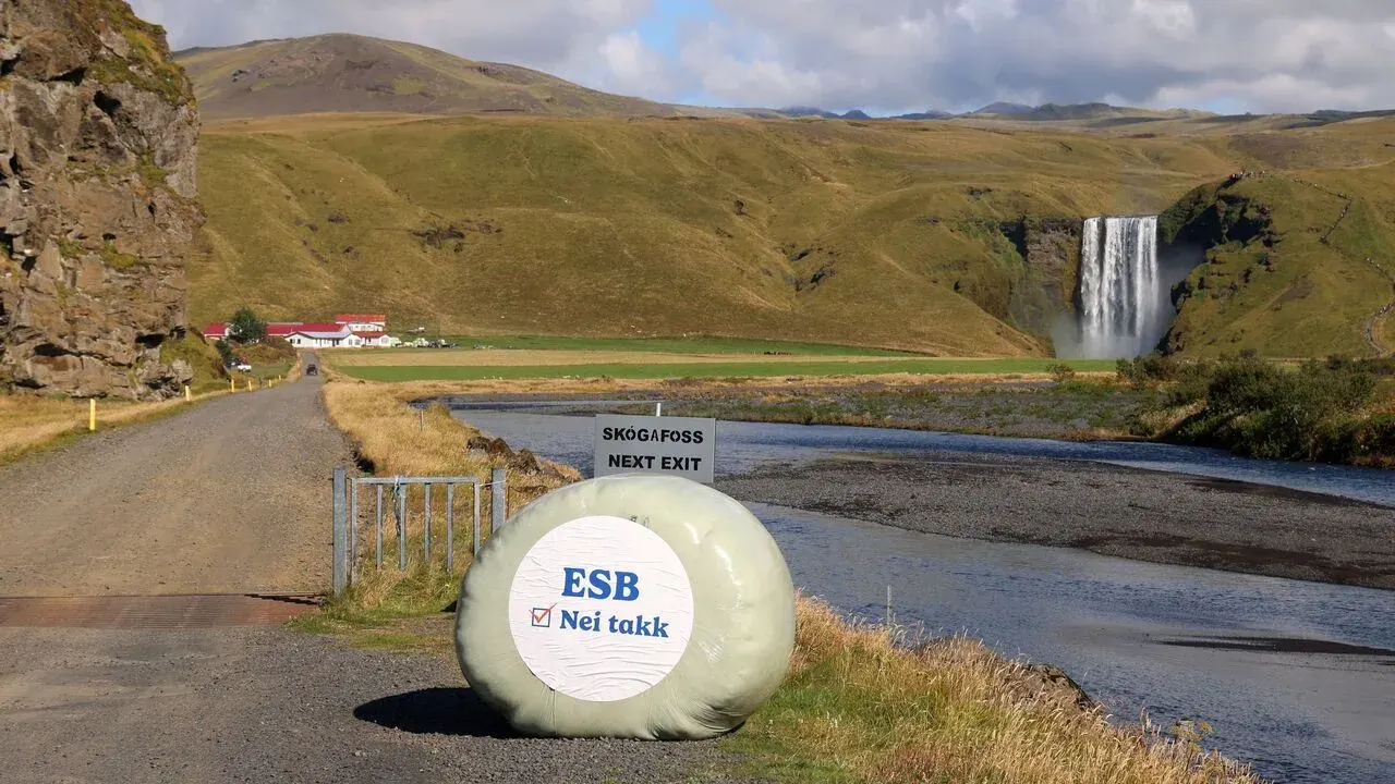 Hay bales near Skogafoss carrying anti-EU slogan in Skogar, Iceland