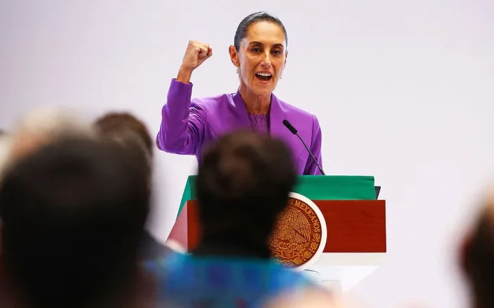 Mexico bond pressure as President Claudia Sheinbaum gestures while marking two years in office in Mexico City