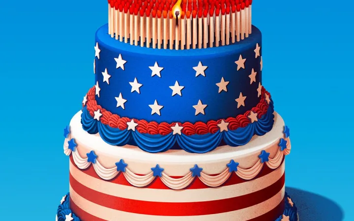 A three-tiered red, white, and blue American-themed cake with a lit match candle on top.