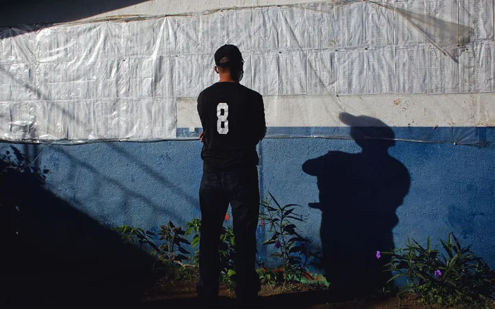 A man checks his name on the electoral roll during an election in Nicaragua