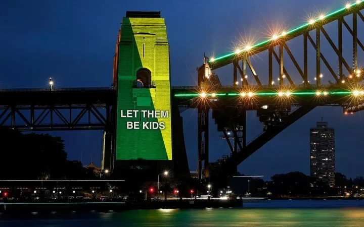 Sydney Harbour Bridge lit up to mark the start of Australia's under-16 social media restriction