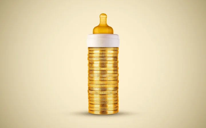 A baby bottle made of stacked gold coins, symbolising the high cost of infant care.