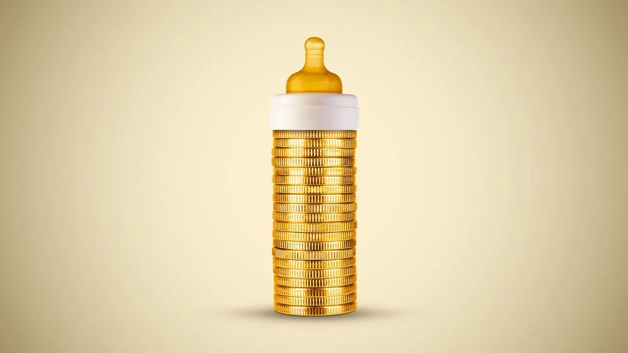 Baby bottle made of stacked gold coins, symbolising Trump Accounts child investment accounts