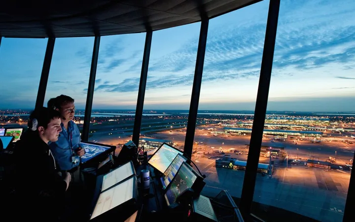 Heathrow control tower at sunset