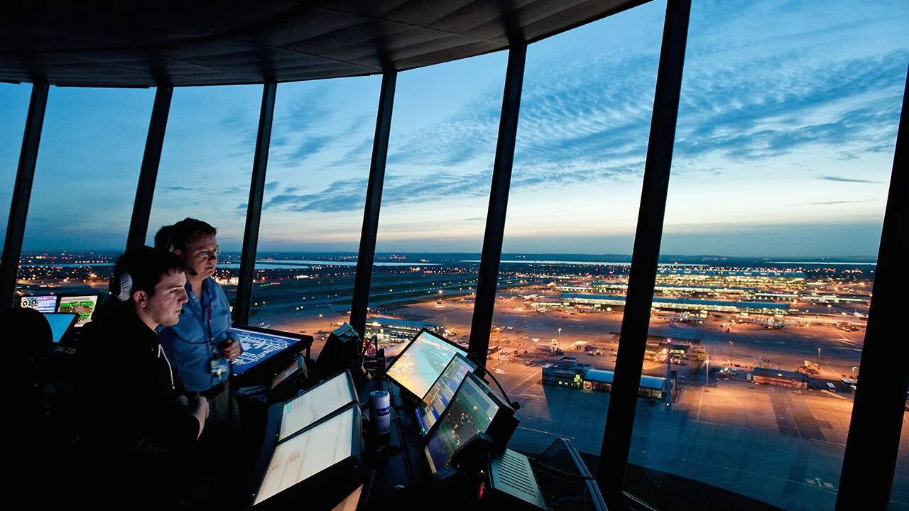 Heathrow control tower at sunset, operated by NATS, Britain's air-traffic-control service