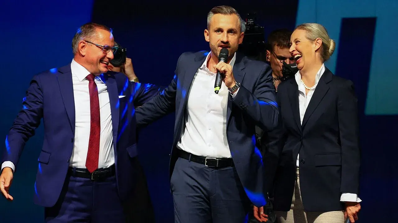 Ulrich Siegmund speaks accompanied by AfD party co-leaders Alice Weidel and Tino Chrupalla at the AfD election party