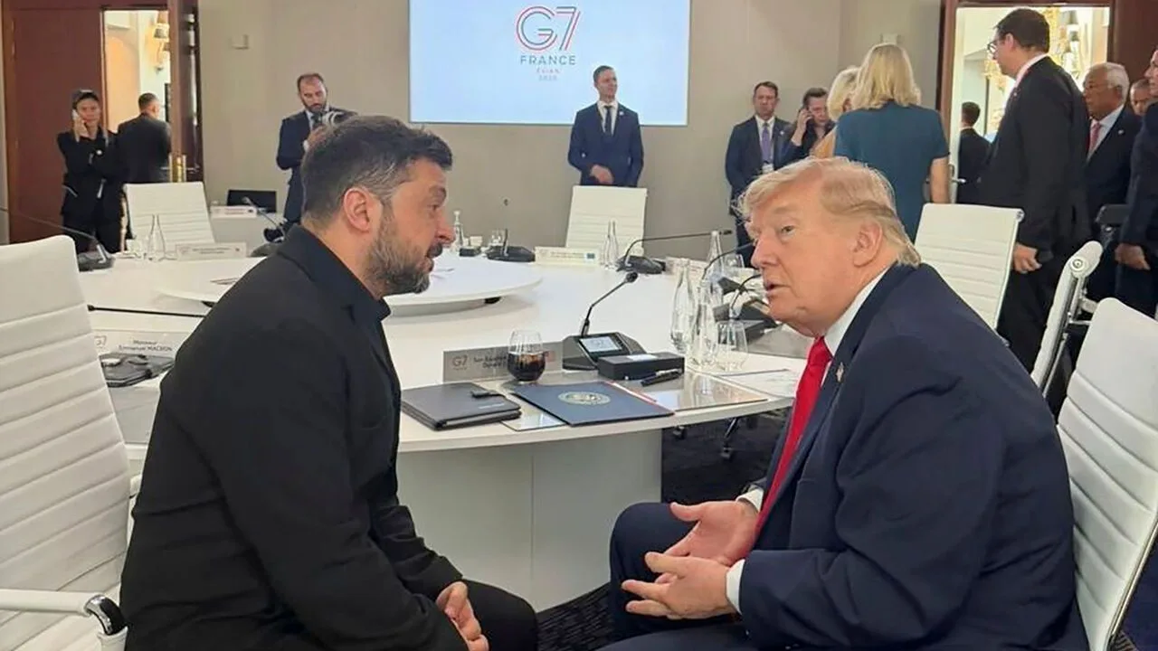 Volodymyr Zelensky and Donald Trump in conversation at the Evian G7 summit in France
