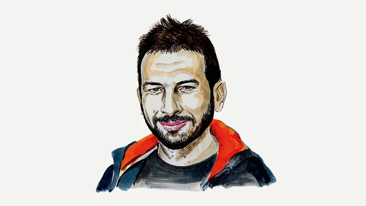 Illustrated portrait of a smiling man with short hair, wearing a dark jacket with an orange collar.