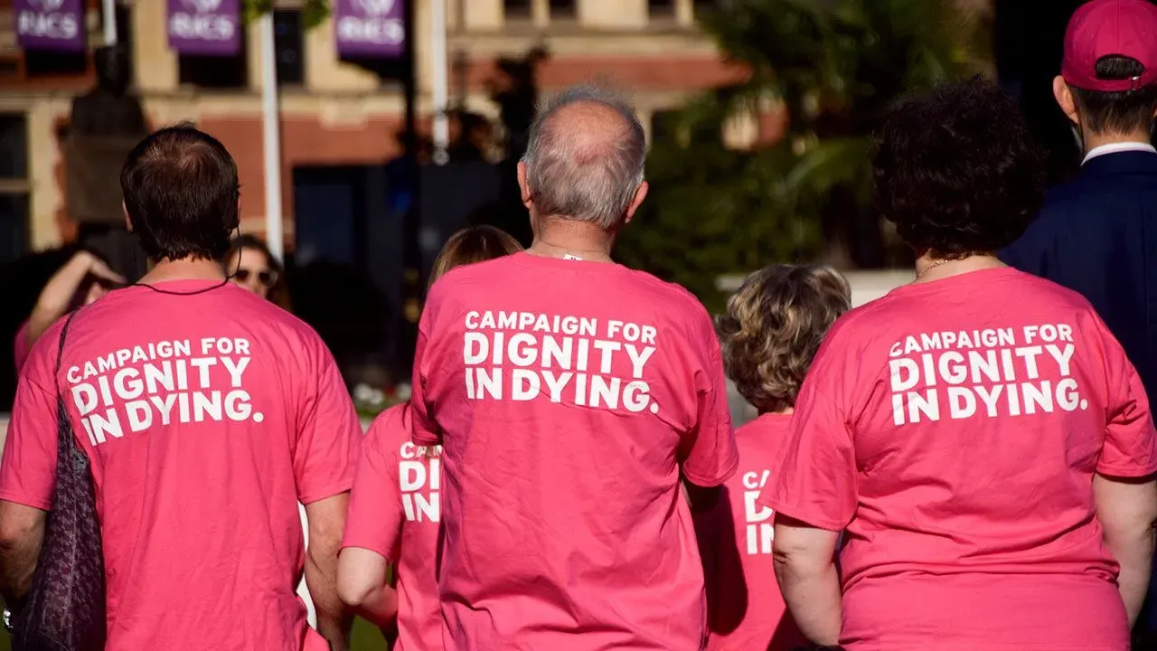 Campaigners from the group Dignity In Dying gather in Parliament Square as the Assisted Dying Bill is debated in September 2025