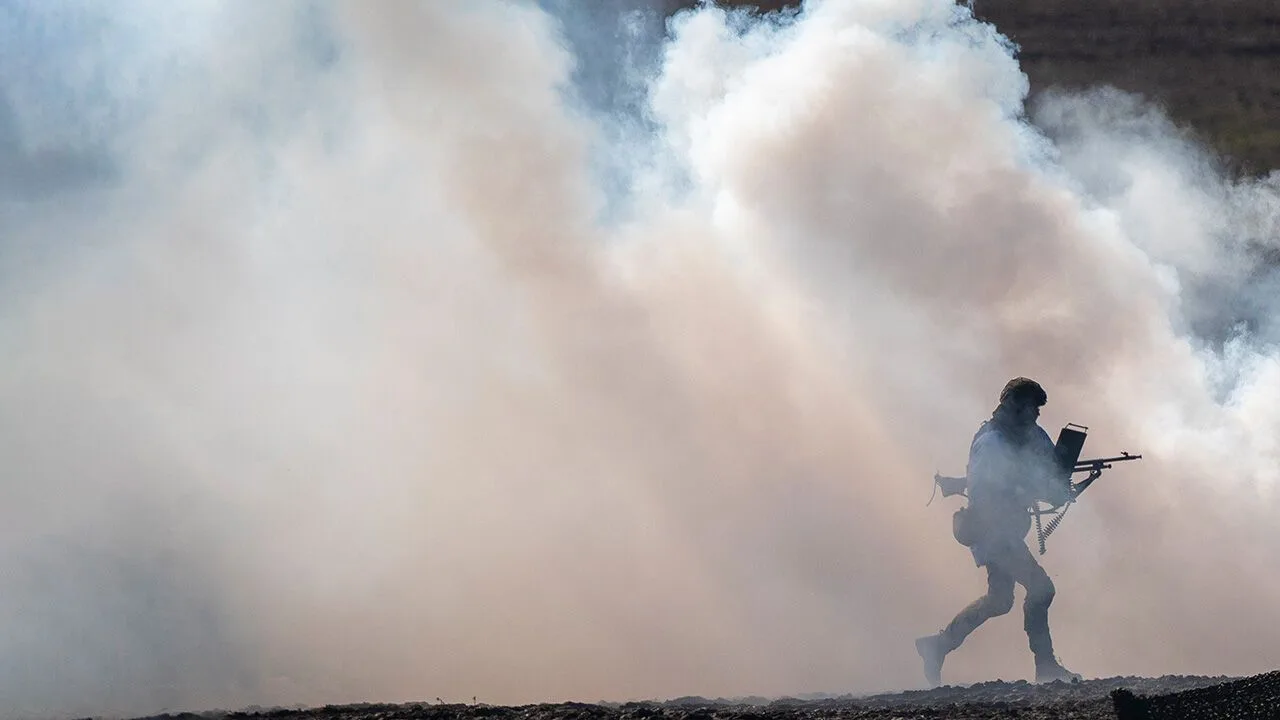 A Lithuanian soldier takes part in a Lithuanian-Polish Brave Griffin 24/II military exercise near the Polish border