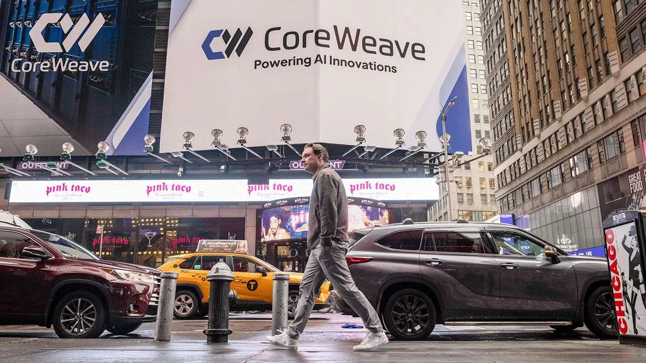 CoreWeave branding displayed in Times Square, New York