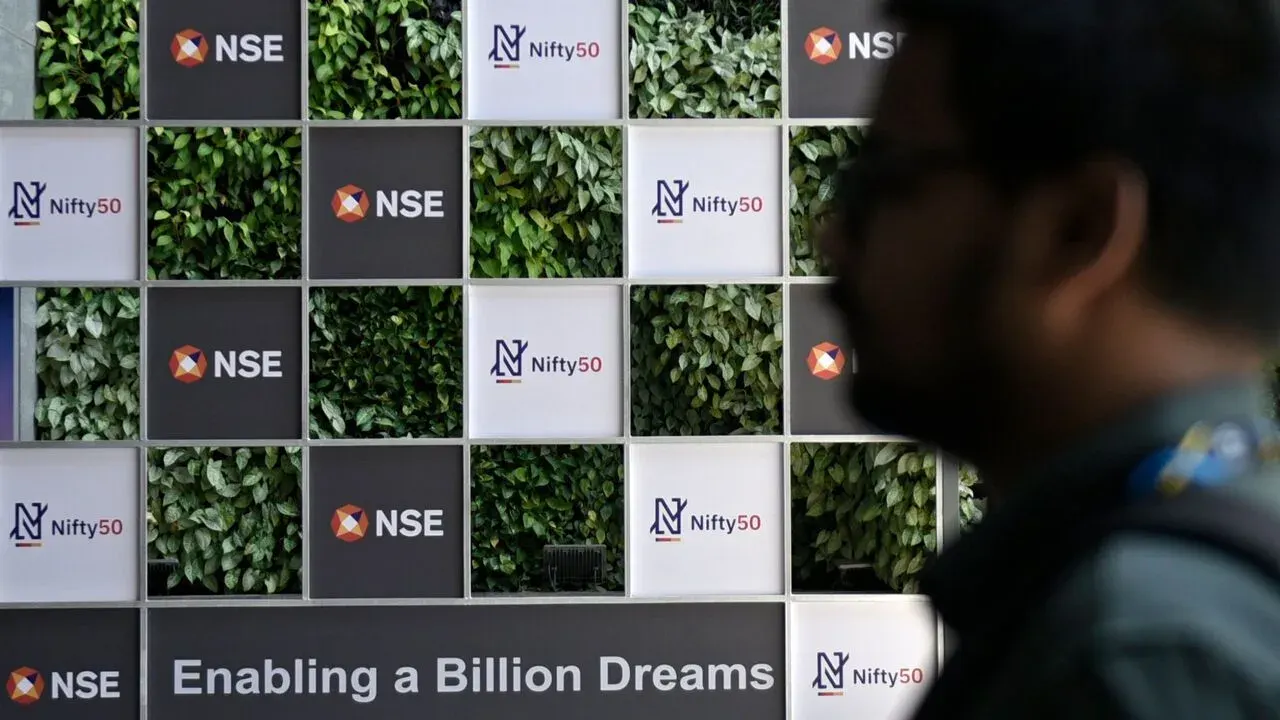 Nifty 50 and National Stock Exchange signage at the NSE building in Mumbai's business district