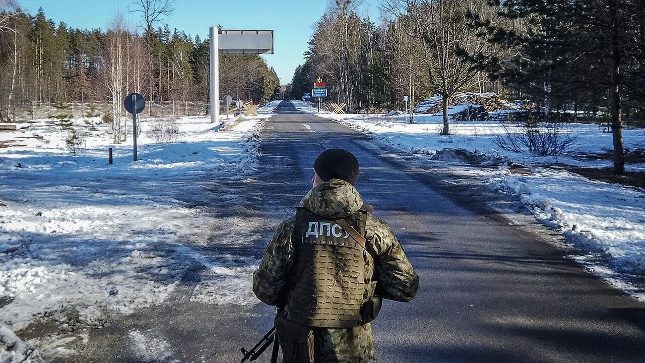 Ukrainian border guard on duty at the Ukraine-Belarus frontier near Vilcha