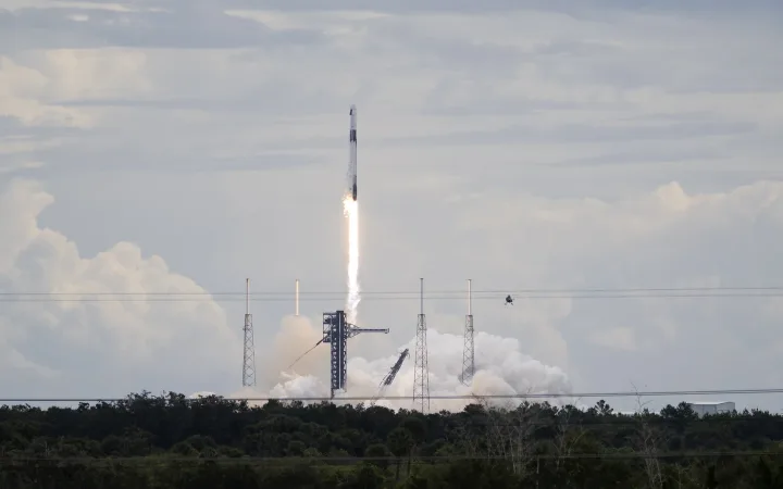Falcon 9 lifting Crew-13’s Dragon spacecraft above its Florida launch pad on October 1, 2026