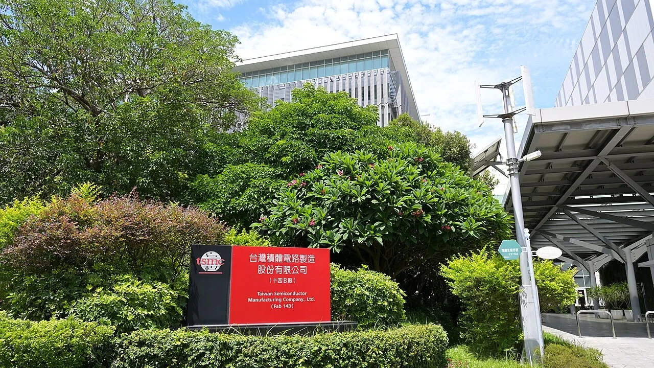 Archival May 2025 photograph of the TSMC Fab 14B sign and factory buildings in Tainan, Taiwan.